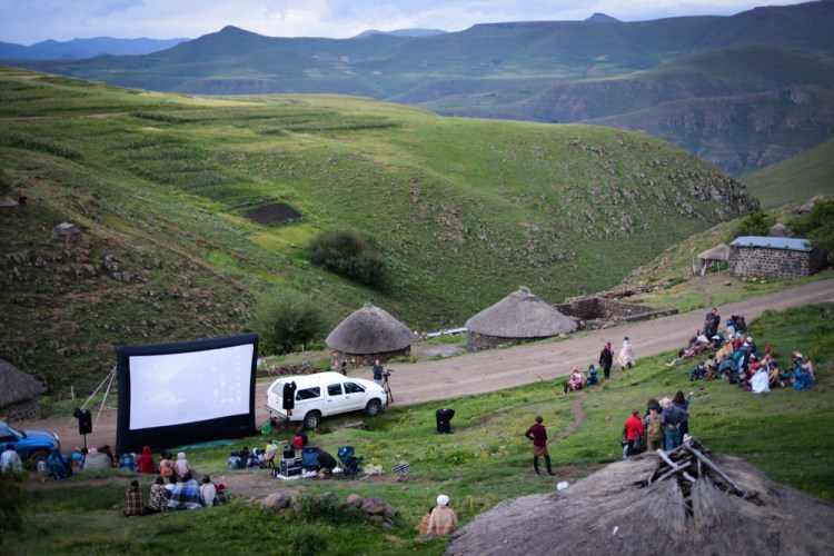 People begin to gather as the screen is set up in a village in Mokhotlong | © Meri Hyöky Photography